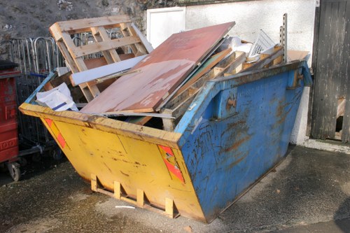 Rubbish collection van operating in South West London