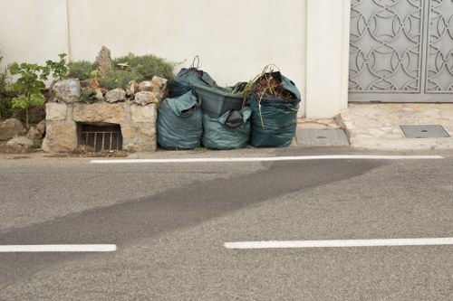 Professional home clearance team removing items from a South West London residence